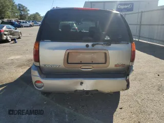 2002 GMC Envoy SLT with VIN 1GKDS13SX22301062, listed as a Copart auction lot 81791024 with 0 mi miles and Salvage Title. Bid and sale history available at carsss.com. Image 6.