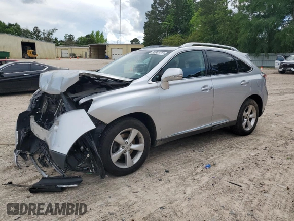 2015 Lexus RX 350 with VIN 2T2BK1BA9FC302248, listed as a Copart auction lot 56641715 with 124,761 mi miles and Salvage title. Bid and sale history available at DreamBid. Image 1.