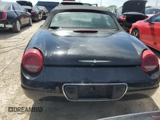 2002 Ford Thunderbird Hardtop Premium z VIN 1FAHP60A42Y128441, wystawiony jako Copart lot #74899624 z przebiegiem Nie podano mil oraz Nie do naprawy • Non repairable. Historia ofert i sprzedaży dostępna na DreamBid. Obrazek 6.