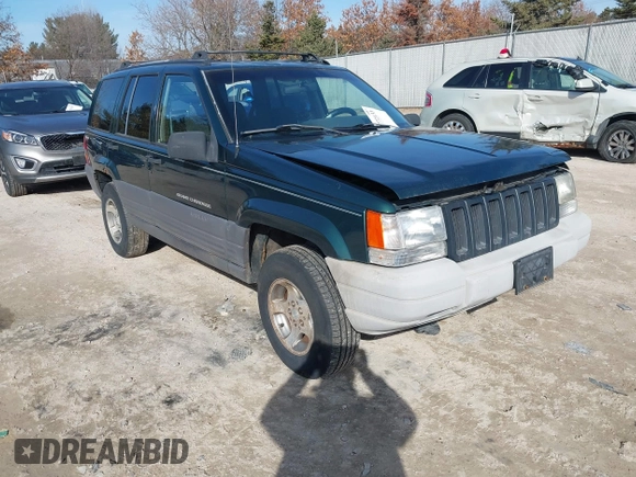 1997 Jeep Grand Cherokee Laredo with VIN 1J4GZ58S2VC595442, listed as a IAAI auction lot 41772133 with 229,764 mi miles. Bid and sale history available at carsss.com. Image 1.