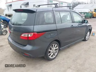 2012 Mazda 5 Touring with VIN JM1CW2CL6C0107233, listed as a IAAI auction lot 41332199 with 130,428 mi miles and . Bid and sale history available at DreamBid. Image 4.
