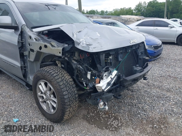 2018 Jeep Grand Cherokee Laredo E with VIN 1C4RJFAG4JC475993, listed as a IAAI auction lot 42295008 with 106,024 mi miles and . Bid and sale history available at DreamBid. Image 6.