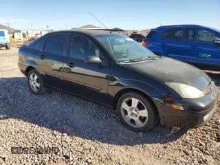 2003 Ford Focus ZTS with VIN 1FAFP38333W249101, listed as a Copart auction lot 77824534 with 163,513 mi miles and Salvage Title. Bid and sale history available at carsss.com. Image 4.