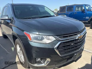 2021 Chevrolet Traverse LT Leather with VIN 1GNEVHKW4MJ184664, listed as a IAAI auction lot 42203200 with 93,996 mi miles. Bid and sale history available at carsss.com. Image 1.
