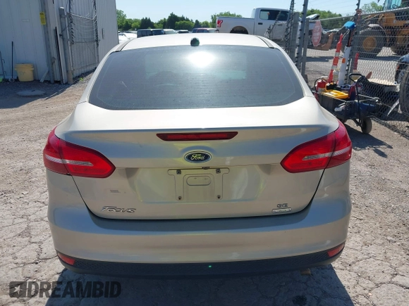 2018 Ford Focus SE z VIN 1FADP3FEXJL210905, wystawiony jako IAAI lot #42264105 z przebiegiem 136 499 mil mil oraz . Historia ofert i sprzedaży dostępna na DreamBid. Obrazek 16.