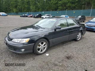 2001 Lexus ES 300 with VIN JT8BF28G110328919, listed as a Copart auction lot 61585495 with 70,011 mi miles and Salvage title. Bid and sale history available at DreamBid. Image 1.