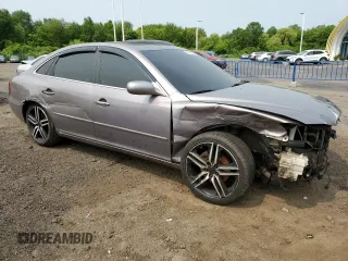 2006 Hyundai Azera SE with VIN KMHFC46F46A105028, listed as a Copart auction lot 59569815 with 219,201 mi miles and Salvage title. Bid and sale history available at DreamBid. Image 4.