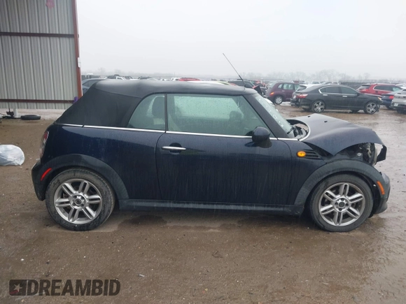 2013 MINI Convertible with VIN WMWZN3C53DT135492, listed as a IAAI auction lot 41436703 with 79,408 mi miles and . Bid and sale history available at DreamBid. Image 13.