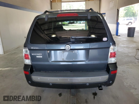 2009 Mercury Mariner Premier z VIN 4M2CU877X9KJ14960, wystawiony jako Copart lot #62951805 z przebiegiem 131 255 mil mil oraz Szkoda całkowita • Salvage title. Historia ofert i sprzedaży dostępna na DreamBid. Obrazek 6.