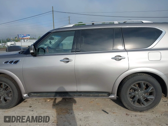 2012 Infiniti QX56 7-passenger z VIN JN8AZ2NE1C9020708, wystawiony jako IAAI lot #42128814 z przebiegiem 173 403 mil mil oraz . Historia ofert i sprzedaży dostępna na DreamBid. Obrazek 14.