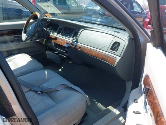 2005 Mercury Grand Marquis LS Premium with VIN 2MEFM75WX5X663507, listed as a IAAI auction lot 42046613 with 85,358 mi miles. Bid and sale history available at carsss.com. Image 5.