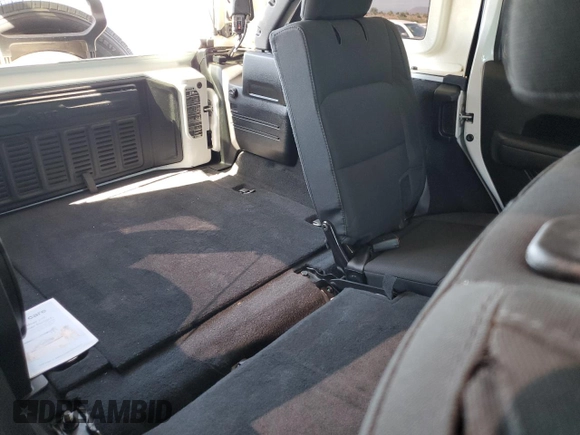 2022 Jeep Wrangler Unlimited Willys with VIN 1C4HJXDN2NW134737, listed as a Copart auction lot 67411754 with 56,296 mi miles and Salvage Title. Bid and sale history available at DreamBid. Image 11.