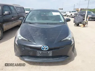 2016 Toyota Prius Two z VIN JTDKBRFU4G3509129, wystawiony jako IAAI lot #42321562 z przebiegiem 246 582 mil mil oraz . Historia ofert i sprzedaży dostępna na DreamBid. Obrazek 12.