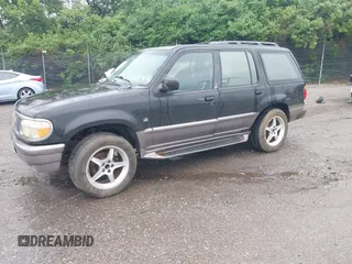 1997 Mercury Mountaineer z VIN 4M2DU55P5VUJ44923, wystawiony jako IAAI lot #42263688 z przebiegiem 146 159 mil mil oraz . Historia ofert i sprzedaży dostępna na DreamBid. Obrazek 2.