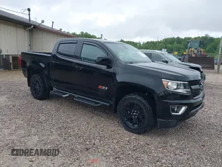 2018 Chevrolet Colorado 4WD Z71 z VIN 1GCGTDEN8J1326741, wystawiony jako IAAI lot #42329905 z przebiegiem 88 835 mil mil oraz . Historia ofert i sprzedaży dostępna na DreamBid. Obrazek 1.