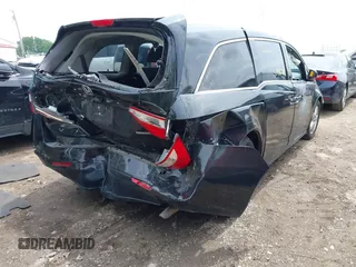 2012 Honda Odyssey Touring with VIN 5FNRL5H91CB121950, listed as a IAAI auction lot 42456620 with 200,831 mi miles and . Bid and sale history available at DreamBid. Image 4.