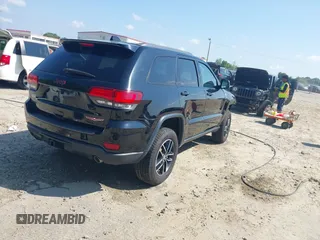 2017 Jeep Grand Cherokee Trailhawk with VIN 1C4RJFLG4HC940652, listed as a IAAI auction lot 42135489 with 102,593 mi miles and . Bid and sale history available at DreamBid. Image 4.