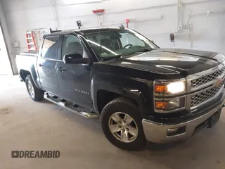 2015 Chevrolet Silverado 1500 LT with VIN 3GCUKRECXFG241779, listed as a IAAI auction lot 41728290 with 140,622 mi miles. Bid and sale history available at carsss.com. Image 1.