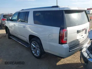 2020 GMC Yukon XL Denali with VIN 1GKS1HKJ6LR282854, listed as a IAAI auction lot 41717072 with 56,715 mi miles and . Bid and sale history available at DreamBid. Image 3.