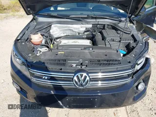 2014 Volkswagen Tiguan S z VIN WVGBV3AX5EW560393, wystawiony jako IAAI lot #42105203 z przebiegiem 102 001 mil mil oraz . Historia ofert i sprzedaży dostępna na DreamBid. Obrazek 10.