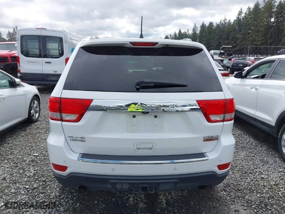 2013 Jeep Grand Cherokee Limited with VIN 1C4RJFBT0DC619216, listed as a IAAI auction lot 41703137 with 142,577 mi miles. Bid and sale history available at carsss.com. Image 16.