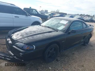 1998 Ford Mustang GT z VIN 1FAFP42X3WF104453, wystawiony jako IAAI lot #41551590 z przebiegiem 109 517 mil mil oraz . Historia ofert i sprzedaży dostępna na DreamBid. Obrazek 2.