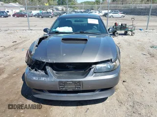 2004 Ford Mustang GT Deluxe with VIN 1FAFP42X44F142786, listed as a IAAI auction lot 42095619 with 100,020 mi miles and . Bid and sale history available at DreamBid. Image 12.