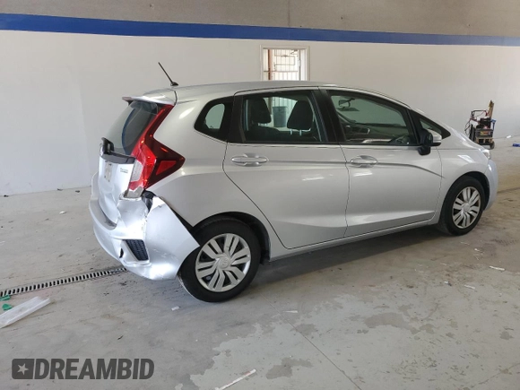 2015 Honda Fit LX z VIN 3HGGK5H52FM717304, wystawiony jako Copart lot #60466295 z przebiegiem 130 422 mil mil oraz Szkoda całkowita • Salvage title. Historia ofert i sprzedaży dostępna na DreamBid. Obrazek 3.