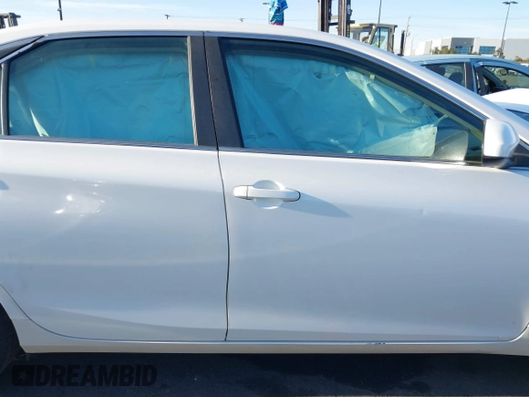 2015 Toyota Camry XLE with VIN 4T1BF1FK9FU923208, listed as a IAAI auction lot 42076970 with 124,096 mi miles and . Bid and sale history available at carsss.com. Image 13.