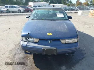 1997 Oldsmobile Cutlass Supreme S z VIN 1G3WH52M3VF338576, wystawiony jako IAAI lot #40573770 z przebiegiem 105 806 mil mil oraz . Historia ofert i sprzedaży dostępna na DreamBid. Obrazek 12.