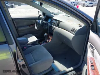 2004 Toyota Corolla CE with VIN 1NXBR32E44Z282985, listed as a IAAI auction lot 41829556 with 162,181 mi miles. Bid and sale history available at carsss.com. Image 5.