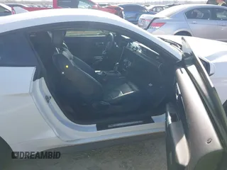 2021 Ford Mustang EcoBoost z VIN 1FA6P8TD5M5133239, wystawiony jako IAAI lot #41899042 z przebiegiem 65 553 mil mil oraz . Historia ofert i sprzedaży dostępna na DreamBid. Obrazek 5.
