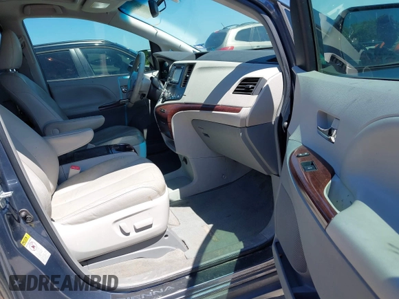 2014 Toyota Sienna XLE with VIN 5TDYK3DC5ES481399, listed as a IAAI auction lot 42085550 with 154,157 mi miles. Bid and sale history available at carsss.com. Image 5.