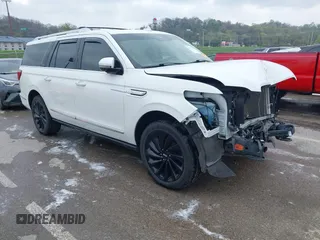 2021 Lincoln Navigator Reserve z VIN 5LMJJ3LT9MEL07595, wystawiony jako IAAI lot #41977779 z przebiegiem 81 088 mil mil oraz . Historia ofert i sprzedaży dostępna na DreamBid. Obrazek 1.