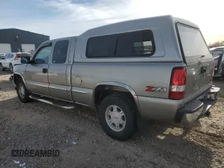 2000 GMC New Sierra 1500 SLE with VIN 2GTEK19T7Y1310097, listed as a Copart auction lot 84557764 with 257,060 mi miles and Salvage Title. Bid and sale history available at carsss.com. Image 2.