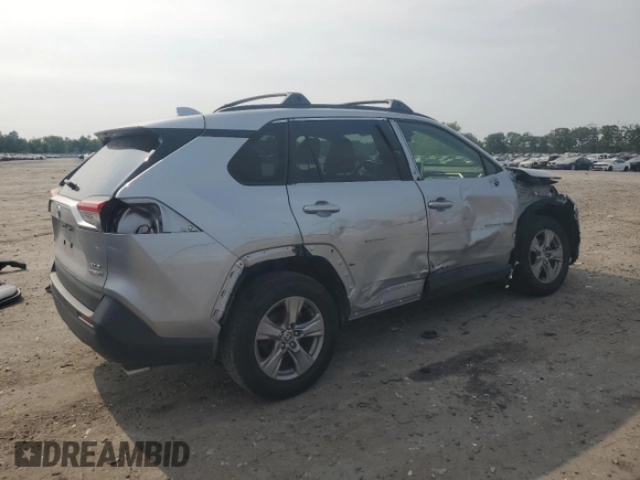 2023 Toyota RAV4 Hybrid XLE with VIN JTMRWRFV7PD166743, listed as a Copart auction lot 59964505 with 87,404 mi miles and Salvage title. Bid and sale history available at DreamBid. Image 3.