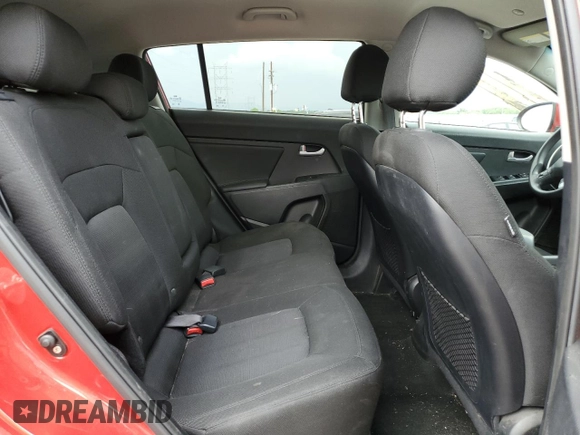 2012 Kia Sportage LX z VIN KNDPBCA29C7253467, wystawiony jako Copart lot #62098675 z przebiegiem 102 629 mil mil oraz Szkoda całkowita • Salvage title. Historia ofert i sprzedaży dostępna na DreamBid. Obrazek 11.