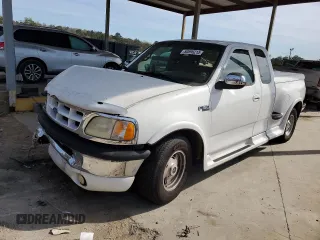 1997 Ford F-150 z VIN 1FTDX0766VKA86983, wystawiony jako Copart lot #50896215 z przebiegiem 214 746 mil mil oraz Szkoda całkowita • Salvage title. Historia ofert i sprzedaży dostępna na DreamBid. Obrazek 1.