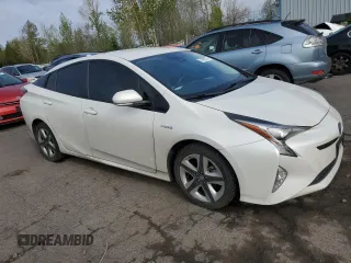 2016 Toyota Prius Four with VIN JTDKARFU2G3027374, listed as a Copart auction lot 51896125 with 128,734 mi miles and Salvage Title. Bid and sale history available at DreamBid. Image 4.
