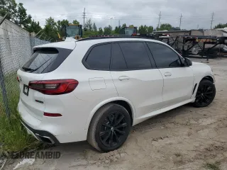 2020 BMW X5 M50i with VIN 5UXJU4C00LLE46181, listed as a Copart auction lot 66190794 with Not Provided miles and Salvage Title. Bid and sale history available at DreamBid. Image 3.