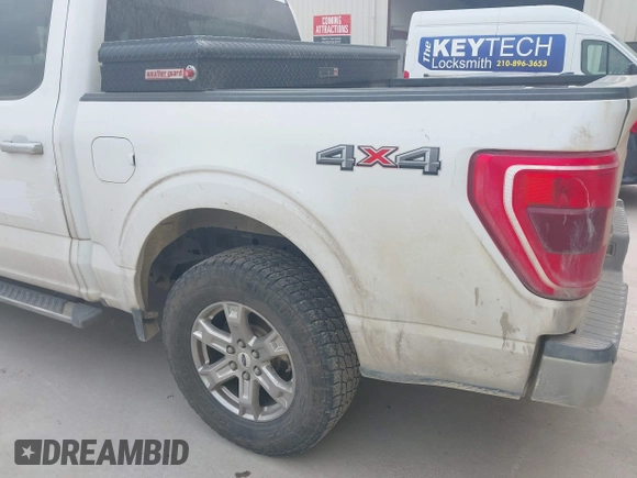 2021 Ford F-150 XL with VIN 1FTEW1EP1MKD07980, listed as a IAAI auction lot 42074902 with 170,631 mi miles. Bid and sale history available at carsss.com. Image 6.
