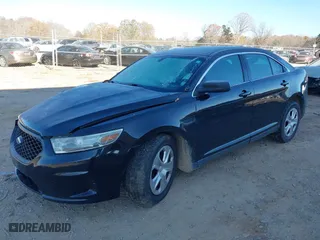 2014 Ford Sedan Police Interceptor with VIN 1FAHP2MK3EG124483, listed as a IAAI auction lot 41018811 with 200,626 mi miles. Bid and sale history available at carsss.com. Image 17.