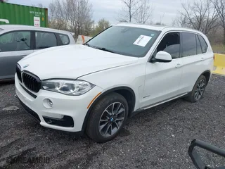 2018 BMW X5 xDrive35i with VIN 5UXKR0C58J0Y05234, listed as a IAAI auction lot 41957904 with 125,658 mi miles. Bid and sale history available at carsss.com. Image 2.
