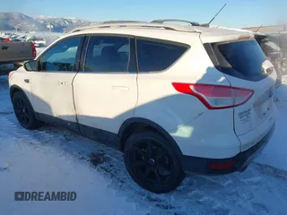 2016 Ford Escape Titanium with VIN 1FMCU9J94GUC81270, listed as a IAAI auction lot 41502724 with 128,161 mi miles. Bid and sale history available at carsss.com. Image 3.