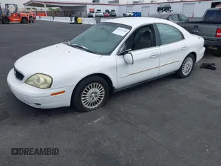 2002 Mercury Sable GS z VIN 1MEFM50U12G628060, wystawiony jako IAAI lot #42072436 z przebiegiem 139 336 mil mil oraz . Historia ofert i sprzedaży dostępna na DreamBid. Obrazek 2.