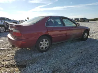 1996 Honda Accord EX with VIN 1HGCD5667TA021809, listed as a Copart auction lot 69371974 with 409,852 mi miles and Salvage Title. Bid and sale history available at carsss.com. Image 3.