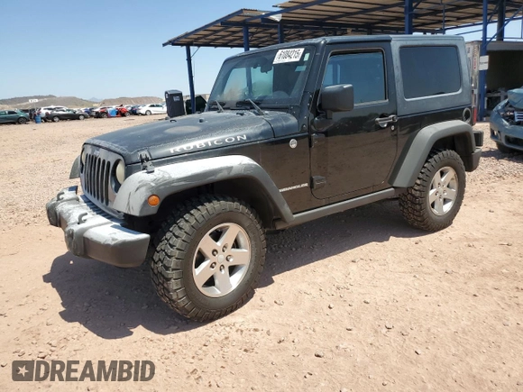 2009 Jeep Wrangler Rubicon with VIN 1J4GA64179L703716, listed as a Copart auction lot 61084215 with 190,262 mi miles and Salvage title. Bid and sale history available at DreamBid. Image 1.