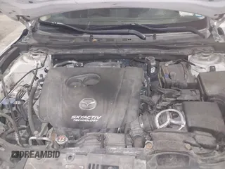 2018 Mazda 3 Touring z VIN 3MZBN1V32JM188650, wystawiony jako IAAI lot #41428819 z przebiegiem 225 611 mil mil oraz . Historia ofert i sprzedaży dostępna na DreamBid. Obrazek 10.
