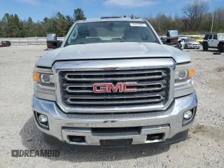 2015 GMC Sierra 2500HD SLT z VIN 1GT12ZE83FF658371, wystawiony jako Copart lot #50228565 z przebiegiem 126 077 mil mil oraz Szkoda całkowita • Salvage title. Historia ofert i sprzedaży dostępna na DreamBid. Obrazek 5.