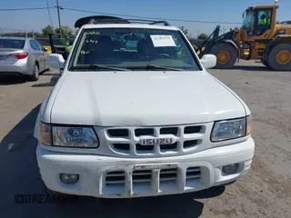 2001 Isuzu Rodeo S with VIN 4S2CK58W614332181, listed as a IAAI auction lot 42585130 with 196,497 mi miles and . Bid and sale history available at DreamBid. Image 12.